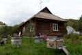 Bee hives near the house in the mountain village of Generalka of the Altai Territory