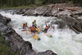 Altai Republic / Russia - June 30 2016: Extreme rafting on the Bashkaus River, extreme sportsmen go through the difficult turbine