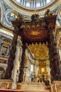 Altar with Bernini`s baldacchino. Interior of Saint Peter`s Basilica in Vatican Royalty Free Stock Photo