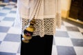 altar boy of the catholic church with thurible in his hand during a celebration Royalty Free Stock Photo