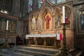 the altar in a cathedral is filled with beautiful sculptures and art