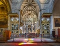 Altar and chapels inside the medieval church of San Francisco, part of the Chapel of Bones. Altar with saints and crucified Jesus Royalty Free Stock Photo