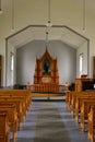Altar and cross of an old rural country church Royalty Free Stock Photo