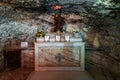 The altar hollowed out in the rock in the Stella Maris Monastery which is located on Mount Carmel in Haifa city in northern Israel Royalty Free Stock Photo