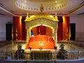 Altar with the Holy Book in the main prayer hall of Guru Nanak Darbar Tatt Khalsa Diwan Gurdwara Sikh Temple. Kuala Lumpur
