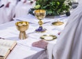 Altar with host and chalice with wine in the churches of the pope of rome, francesco