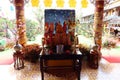 Altar with the image of Buddha at the entrance of the main hall of the Phap Bao Temple. Hoi An, Vietnam