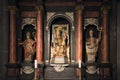 Medieval altar with Statue St. Mary and child Jesus