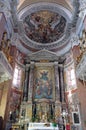Altarpiece of the Trinity depicts the Father and the Holy Spirit accompanied by angels, Church San Giacomo in Augusta in Rome