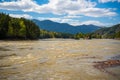 The Altay landscape with mountain river Katun and green rocks at spring time, Siberia, Altai Republic Royalty Free Stock Photo