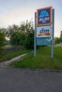 Altbach, Germany - Logo of the company Aldi and Dm Market. Information about opening times.