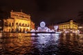 Alte Oper, Old Opera, concert hall, opera house in Frankfurt, Germany, with Christmas decorated fountain during winter evening Royalty Free Stock Photo