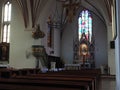 The alter of a cathoric church with stained glass in Widuchowa Poland