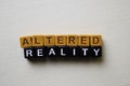 Altered Reality on wooden blocks. Business and inspiration concept