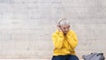 Alternative caucasian female student listening to music with headphones Royalty Free Stock Photo