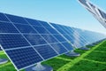 Alternative energy, green energy, solar panels on green grass, photovoltaic panels, solar energy collection. Mixed media, copy