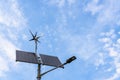 Alternative energy sources. Renewable photovoltaic technology with solar energy power panel and wind turbine. Sun energy Royalty Free Stock Photo