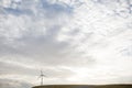 Single wind turbine on a hill Royalty Free Stock Photo