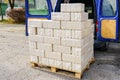 Alternative fuel, bio fuel. Packed eco briquettes from pressed sawdust for stoves and fireplace Royalty Free Stock Photo