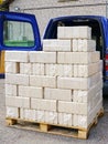Alternative fuel, bio fuel. Packed eco briquettes from pressed sawdust for stoves and fireplace Royalty Free Stock Photo