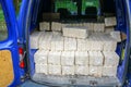 Alternative fuel, bio fuel. Purchased eco briquettes from pressed sawdust for stoves and fireplace Royalty Free Stock Photo