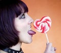 Alternative Girl with a Heart Lollipop Royalty Free Stock Photo