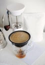 Alternative manual coffee brewing in porous ceramic paperless dripper filter. Gooseneck kettle. Manual coffee grinder