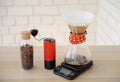 Alternative manual hand brewing coffee. Drip batch filter. Red coffee grinder. Electronic scale