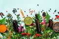 Alternative medicine. Holistic approach. Healing herbs and flowers over blue background. Top view, copy space, flat lay. Banner