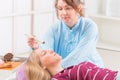 Alternative medicine therapist doing moxa treatment Royalty Free Stock Photo