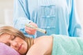 Alternative medicine therapist doing moxa treatment Royalty Free Stock Photo