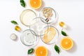Alternative natural medicine and glass labware, petri dish, cream jars, scrub, aroma oils. Avocado oil and fruit