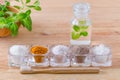 Alternative natural mouthwash with mint, toothpaste xylitol or soda, turmeric - curcuma, himalayan salt, clay or ash, coconut oil Royalty Free Stock Photo