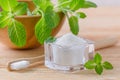 Alternative natural toothpaste xylitol, soda, salt, and wood toothbrush closeup, mint on wooden Royalty Free Stock Photo