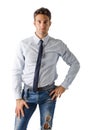 Alternative young business man wearing shirt, tie and ripped jeans Royalty Free Stock Photo