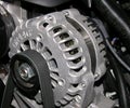 Alternator on an automobile. Royalty Free Stock Photo