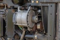 Alternator and serpentine belt on farm tractor. Royalty Free Stock Photo