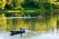 Althom, Pennsylvania, USA 8/10/2019 A boat and kayaks on the Allegheny river in Warren county