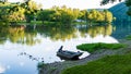 Althom, Pennsylvania, USA 8/10/2019 A fishing boat tied up to the shore on the Allegheny river in Warren county