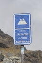 Altitud sign at the top of Salkantay mountain in Peru