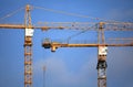 Altitudinal construction cranes and building construction site Royalty Free Stock Photo