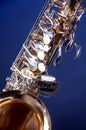 Alto Saxophone Isolated on Blue Royalty Free Stock Photo