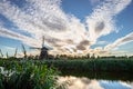 Altocumulus clouds over a windmill in Holland Royalty Free Stock Photo