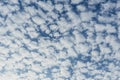 Altocumulus patch layered fluffy clouds