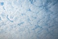 Altocumulus, Sunlight penetrating clouds, Beautiful big clouds in the beautiful sky, Blue background. Royalty Free Stock Photo