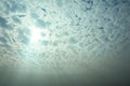 Altocumulus, Sunlight penetrating clouds, Beautiful big clouds in the beautiful sky, Blue background. Royalty Free Stock Photo