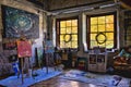 View of an art studio with painting with paintings on the easels