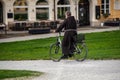 Monk riding bike