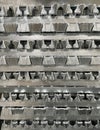 Aluminium alloy ingots stacked in the foreground, high-pressure die casting material, raw material, resources for the automotive Royalty Free Stock Photo