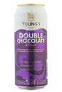 Aluminium can beer Young`s Double Chocolate Stout, on white background. Insulated packaging for catalog. Water drops. File